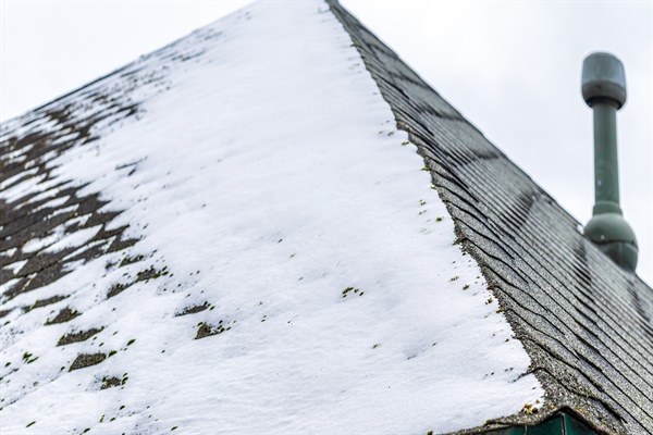 How Does Snow and Ice Buildup Affect Residential Roofs?