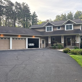 Aging asphalt shingle roof before new roof installation