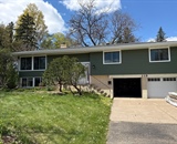 Front exterior of River Falls home before siding renovation