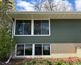 River Falls home exterior before new LP SmartSide siding