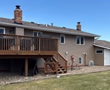 Rear of Hudson, WI home before seamless vinyl siding replacement