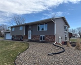 Home exterior with new seamless vinyl siding near Hudson, WI