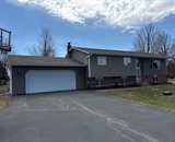 Front exterior after seamless vinyl siding replacement near Hudson, WI