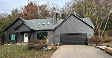 Exterior of Dark Grey Single Level House