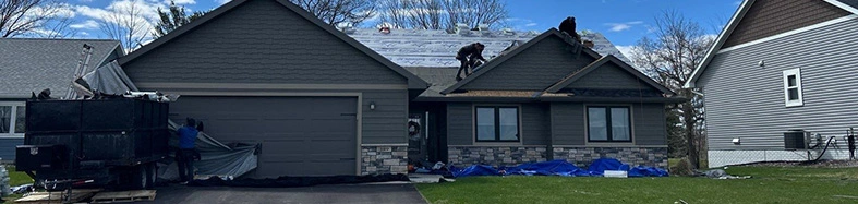 Roofing Replacement of Dark Grey House