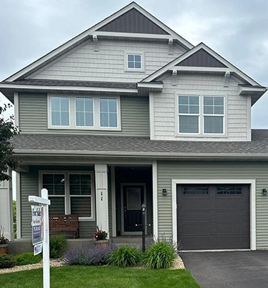 Exterior of Two Story Duotone Siding Color House